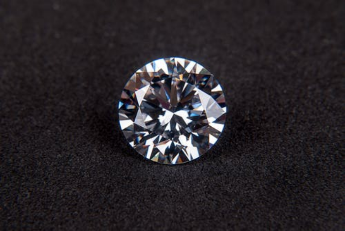 a diamond on a black surface